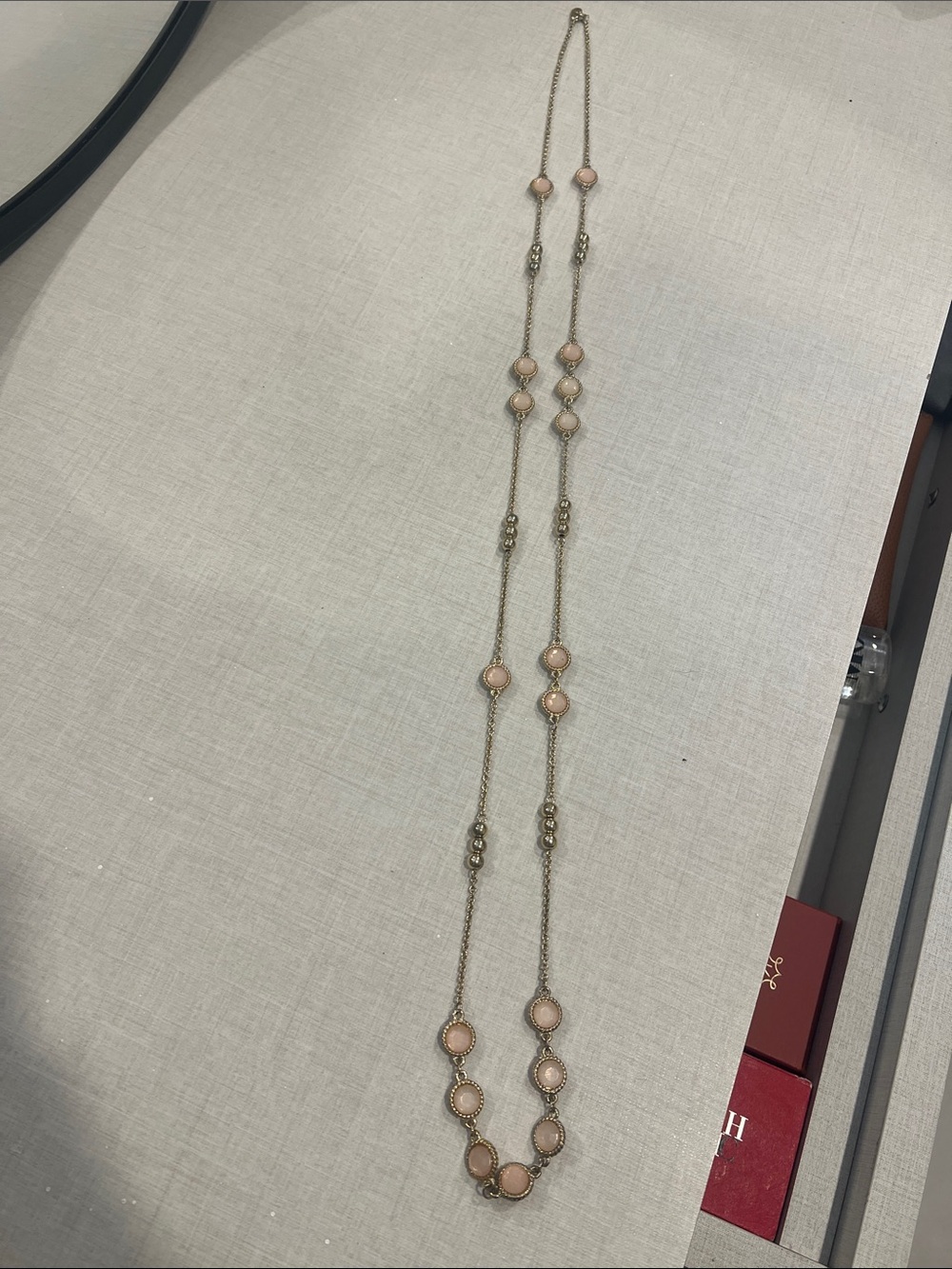 Long Gold Necklace with Pink Stone Accents